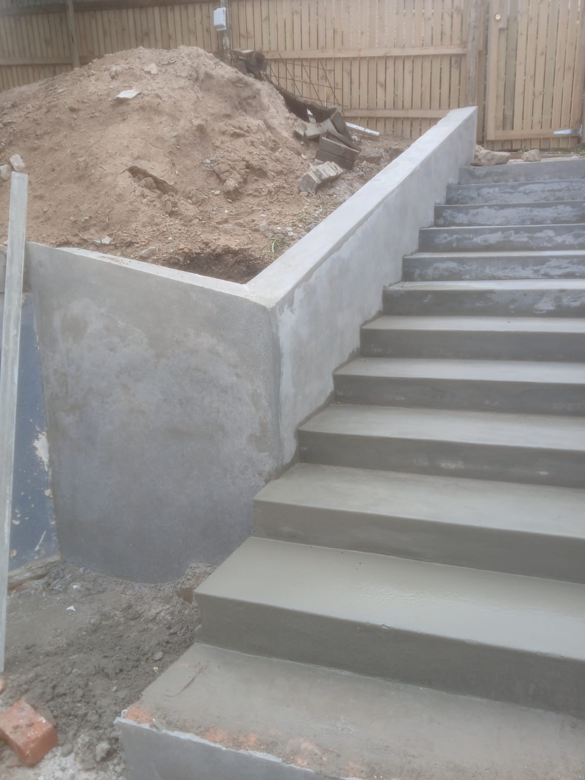 Concrete stairs and retaining walls during construction